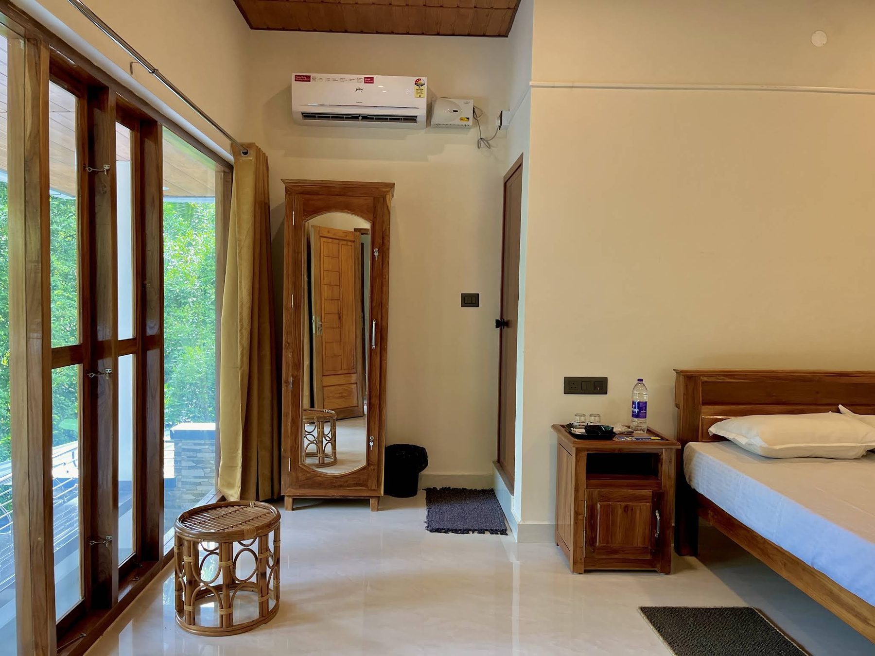 Bedroom with full-height glazed doors opening onto the balcony